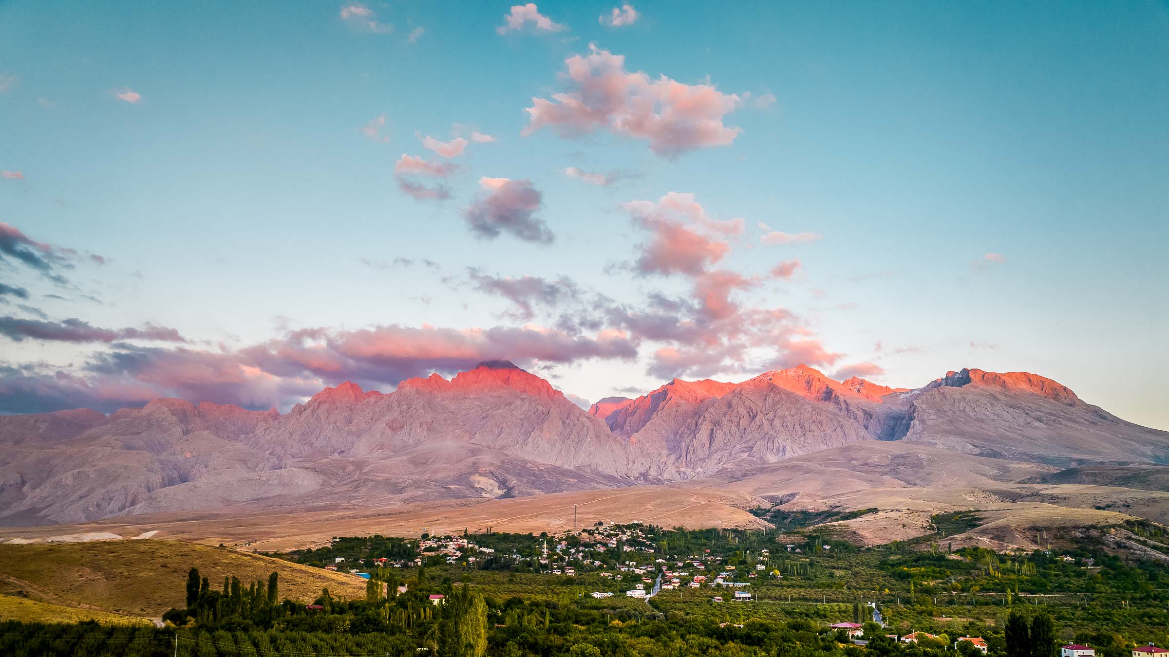 Evening light on the Aladağlar peaks above the farmland of the Emli side