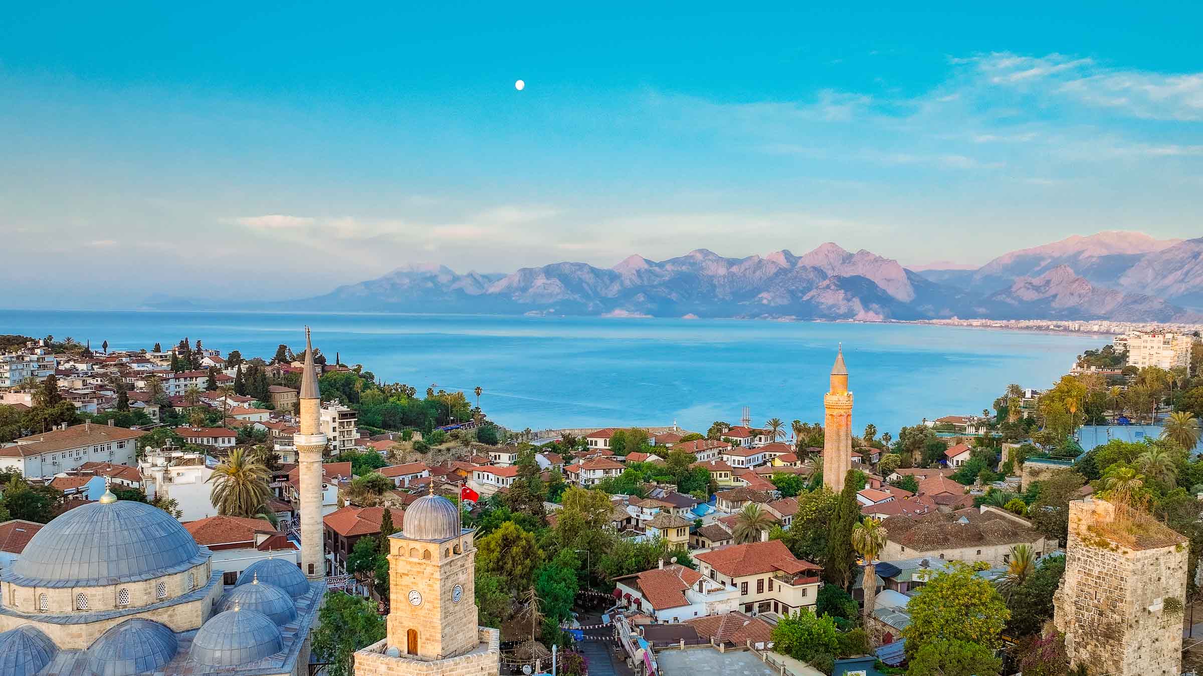 Kaleiçi, Antalya's old town, with its fluted minaret, domes and the bay below the mountains