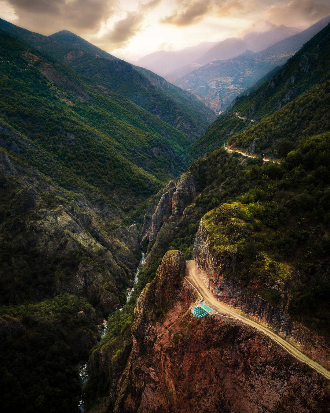 A road winding along the steep, forested walls of Hatila Valley