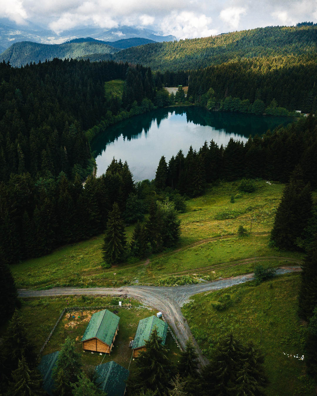 Şavşat Karagöl lake in its forested basin, seen from above